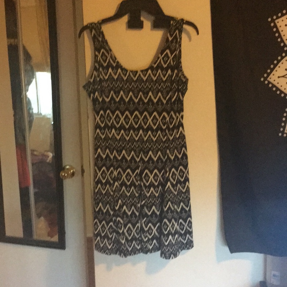 BLACK DRESS WITH CUTE PATTERN ON IT